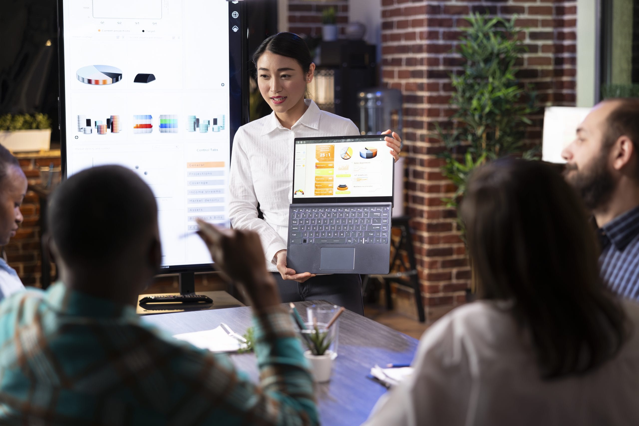 asian financial advisor presents market trends scaled